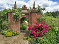Entrance arch to the Mediterranean Garden East Ruston Old Vicarage Gardens Summer July