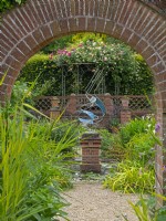 Entrance to the sunken garden at East Ruston gardens in Norfolk  July Summer