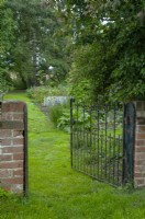 Open gate leading into kitchen garden