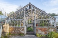 View of a rustic Victorian greenhouse in Autumn - November