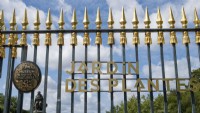 Paris France 
Jardin des Plantes gardens. Gilded fencing and entrance sign. 