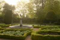 The Fountain Garden at sunrise in the Crathes Castle Walled Garden.