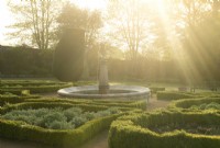 The Fountain Garden at sunrise  in the Crathes Castle Walled Garden.