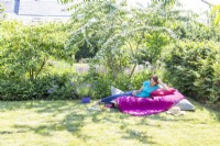 Woman relaxing on large bean bag