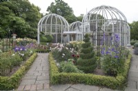 Rose garden with topiary and Aviary at Birmingham Botanical Gardens and Glasshouses, June