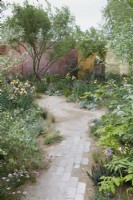 The Nurture Landscapes Garden. Designer: Sarah Price. A garden using low carbon materials. Chelsea Flower Show. Gold Medal.