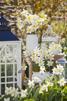 White themed arrangement with daffodils.