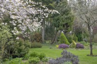 'A Rock Feature' amongst trees at Barnsdale Gardens, April
