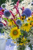 Summer flower bouquet containing Helianthus, Echinacea, Rudbeckia, Echinops and Persicaria.