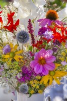 Bouquet of summer flowers including Dahlia, Echinops, Echinacea, Monarda, Persicaria, Rudbeckia, Ammi majus, Crocosmia, Verbena, Fennel and  Gladiolus.