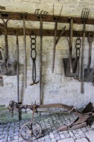 Display of vintage garden tools at Parham House in West Sussex