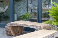 Log bench seats made from tree trunks 