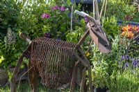 A goat sculpture amde from old reused rusty metal