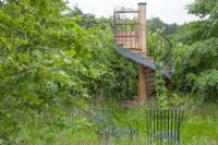 Wooden spiral staircase in the Belmond Enchanted Gardens - RHS Chatsworth Flower Show 2017