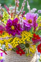 Summer bouquet made of Dahlia, Echinacea purpurea, Persicaria, Monarda, Tanacetum vulgare and Verbascum.