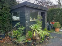 Garden potting shed in winter 