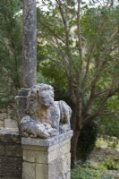 Sculpture of a lion outside the Cloisters at Iford Manor