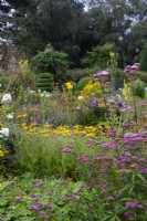 Eupatorium, achillea and rudbeckia in The Flower Garden borders at The Manor, Little Compton.