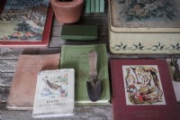 Potting shed bench with gardening books and guides