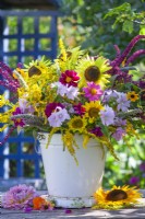 A bucket full of summer flowers including Dahlia, Sunflovers, Amaranthus caudatus, Solidago, Agastache and Malva.