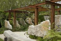 RHS Chelsea Flower Show 2023 - Concrete panels suspended in a steel pergola - Samaritans' Listening Garden designed by Darren Hawkes