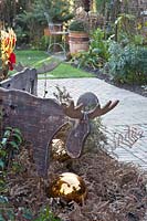 Wooden moose as garden decoration 
