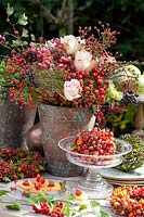Decoration with berries and flowers, Rosa Upper Secret, Crataegus, Sambucus nigra, Euonymus alatus, Ammi majus, Smilax aspera 