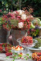 Decoration with berries and flowers, Rosa Upper Secret, Crataegus, Sambucus nigra, Euonymus alatus, Ammi majus, Smilax aspera 