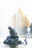 Figure of Arion riding on a dolphin in the Arion Fountain, Schwetzingen Palace Garden 
