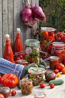 Pickled tomatoes and cucumbers, tomato juice, tomato sauce, cucumber relish Solanum lycopersicum, Cucumis sativus 