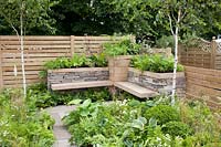 Raised beds with integrated bench 