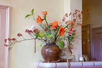 Bouquet of flowers on a mantelpiece 