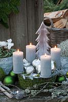 Advent wreath in a wire basket 