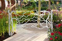Artistically designed metal garden gate 