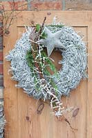 Christmas wreath with grey sprayed fern leaves 