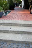Concrete stairs and terrace with clinker paving 