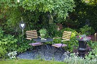 Seating area in small garden 