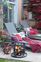 Terrace in autumn with fire basket 
