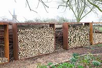 Corten steel shelves for firewood 