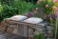 Seating area with roses and sage, Rosa Augusta Luise, Salvia, 