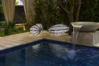 Lighting in evening by the pool. Water bowl feature and brass floor lamps inspired by nature. 
Designer: Vetschpartner, Berger Gartenbau and Livingdreams. Giardina-Zurich, Swiss. 


 
