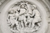 Bas-relief stone carving depiction of Putti shepherds, Italian Gardens, Kensington Gardens, London, UK 