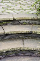 Layers of slate used as risers in steps at York Gate Garden