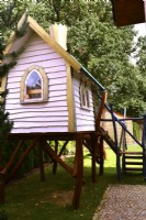 A playhouse in playground in the garden
